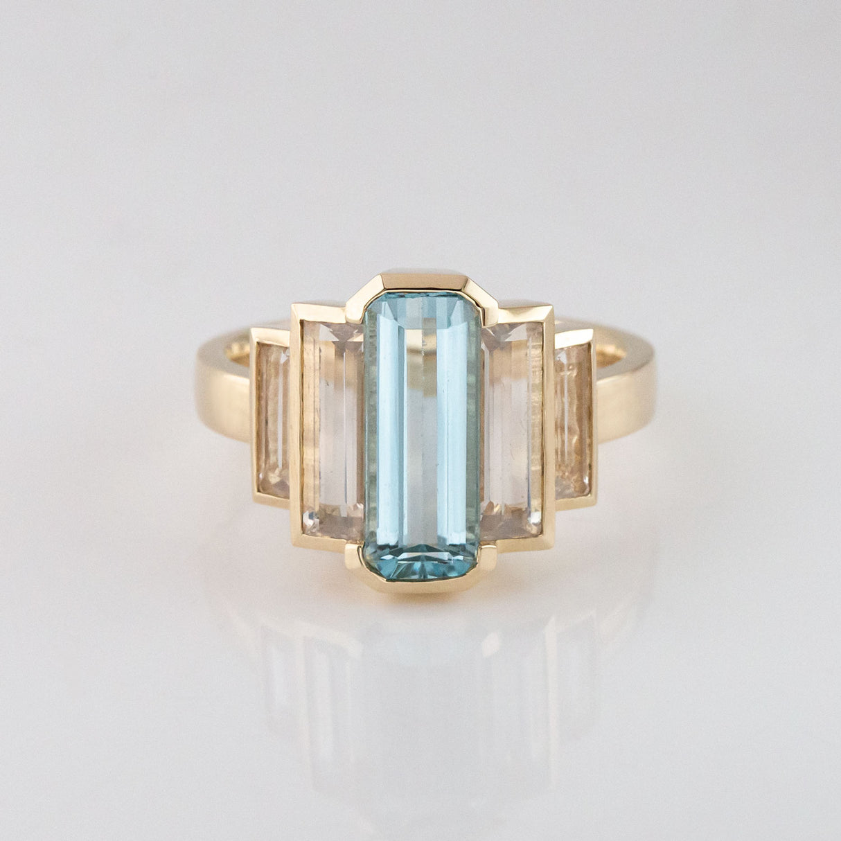 Aquamarine and Misty Quartz Refraction ring in 9 carat Gold