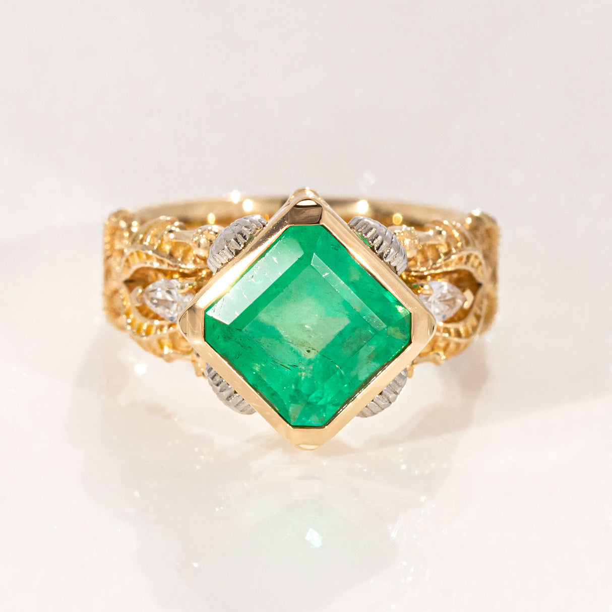 3.47 carat Emerald Seahorse Temple ring with Diamonds in 18 carat Gold and Platinum