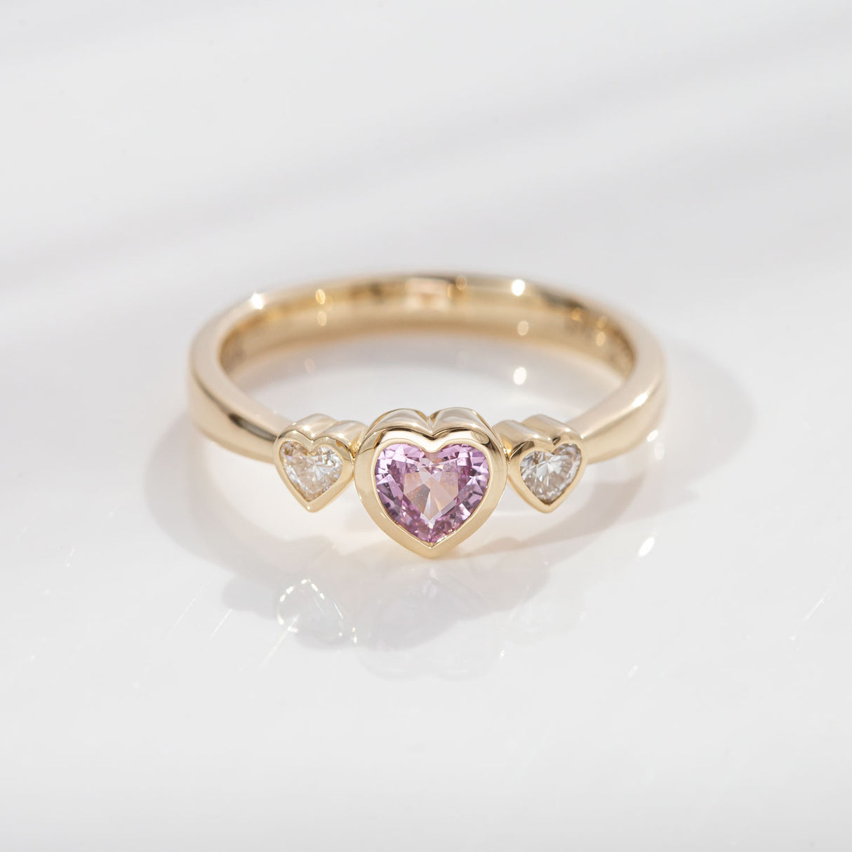Pink Sapphire Petit Amour ring with Diamonds in 9 carat Gold