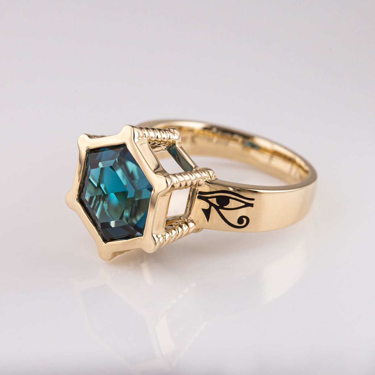 Eye of Horus / Eye of Ra ring with London Blue Topaz in 9 carat Gold
