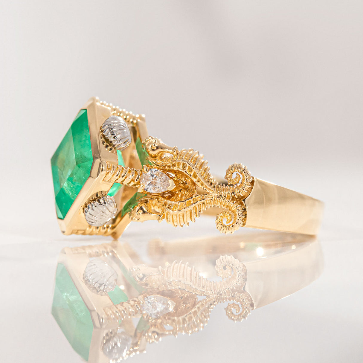 3.47 carat Emerald Seahorse Temple ring with Diamonds in 18 carat Gold and Platinum