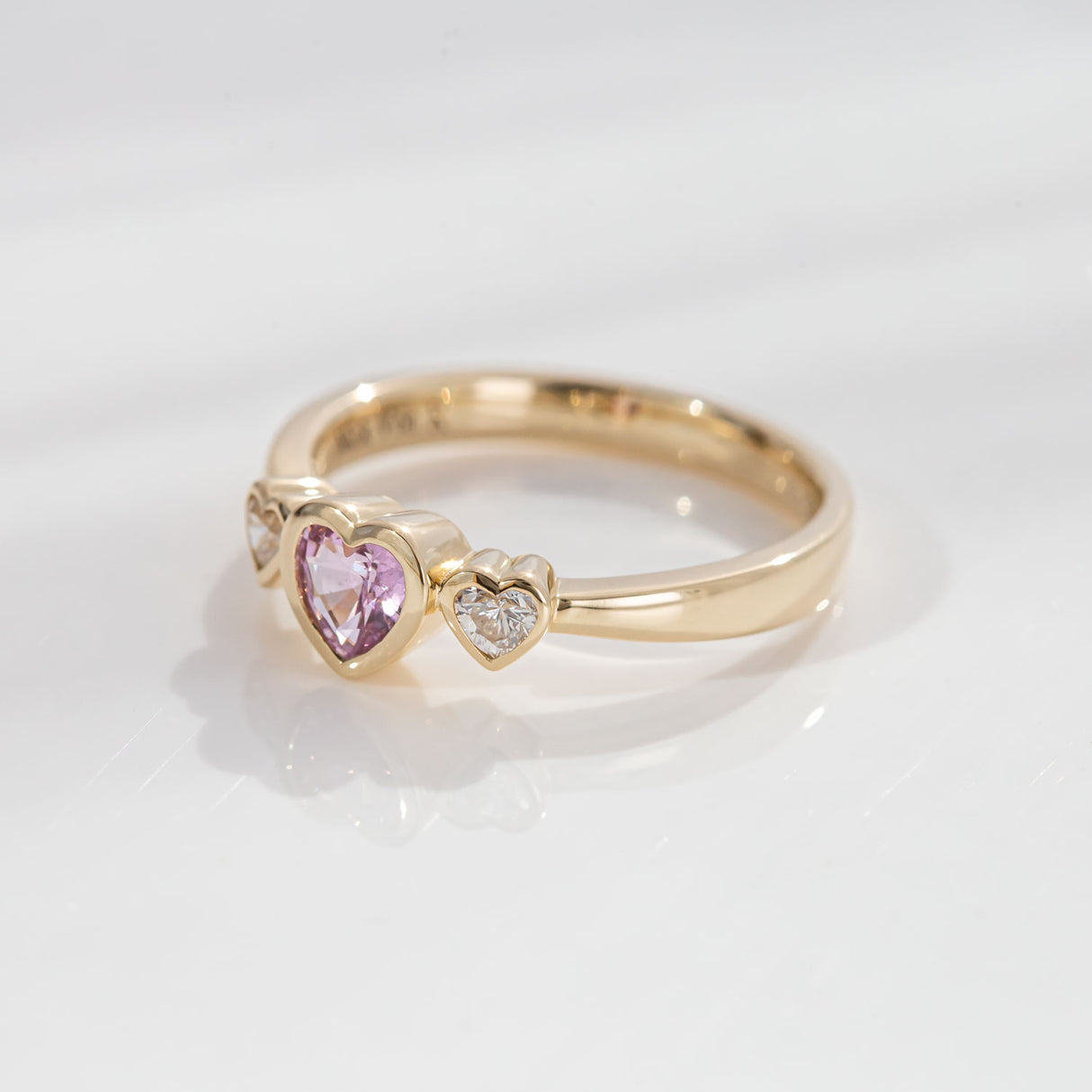 Pink Sapphire Petit Amour ring with Diamonds in 9 carat Gold