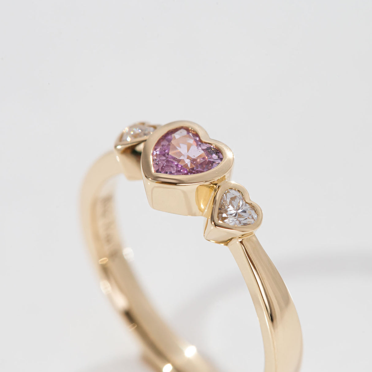Pink Sapphire Petit Amour ring with Diamonds in 9 carat Gold