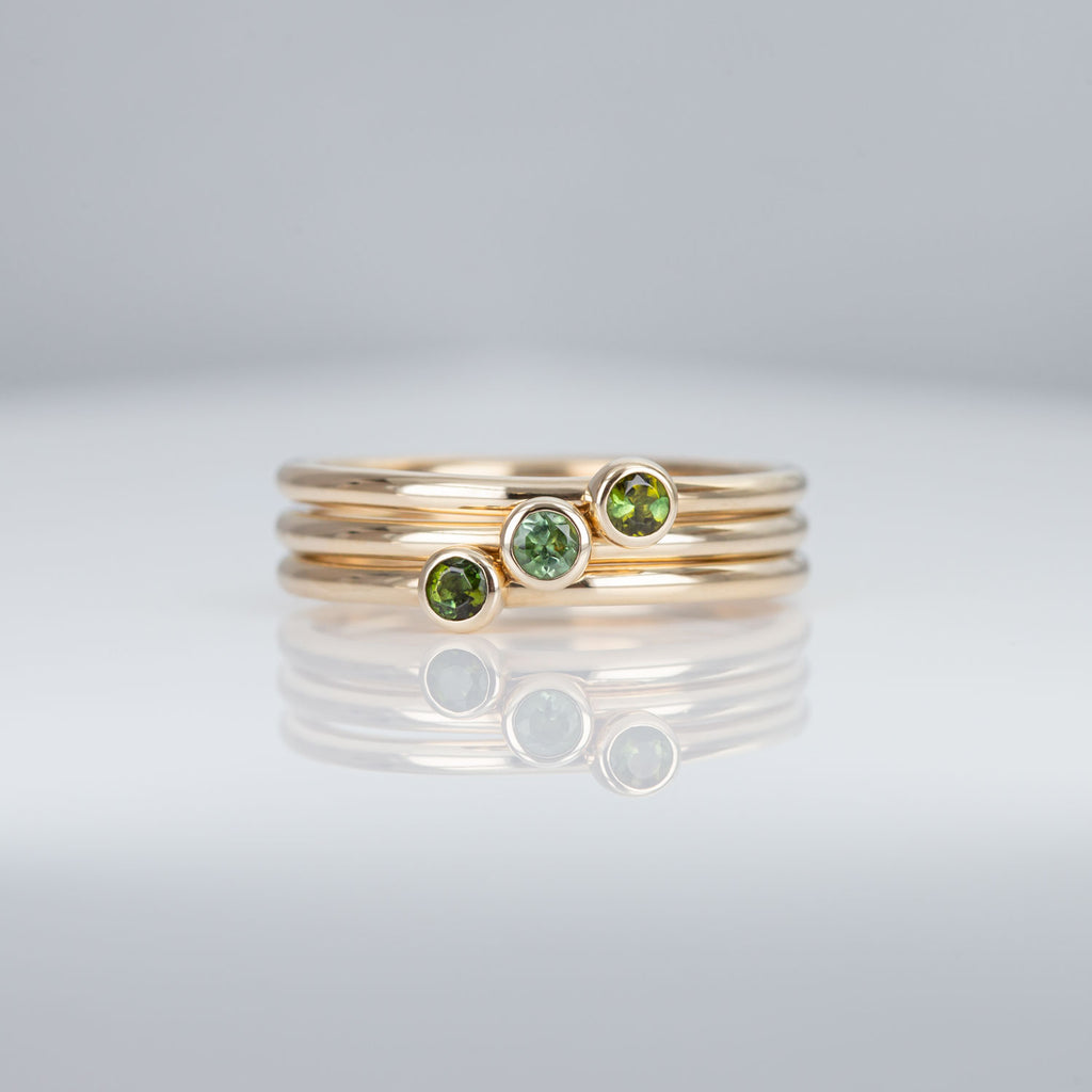 Moss Green 3 Muses ring with Tourmalines set in 9 carat Yellow Gold