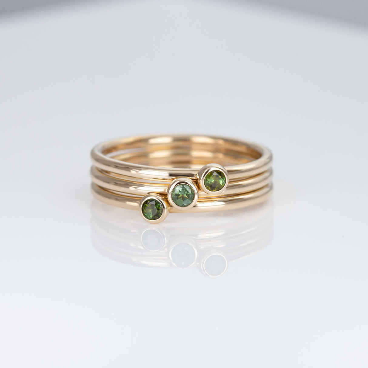 Moss Green 3 Muses ring with Tourmalines set in 9 carat Yellow Gold