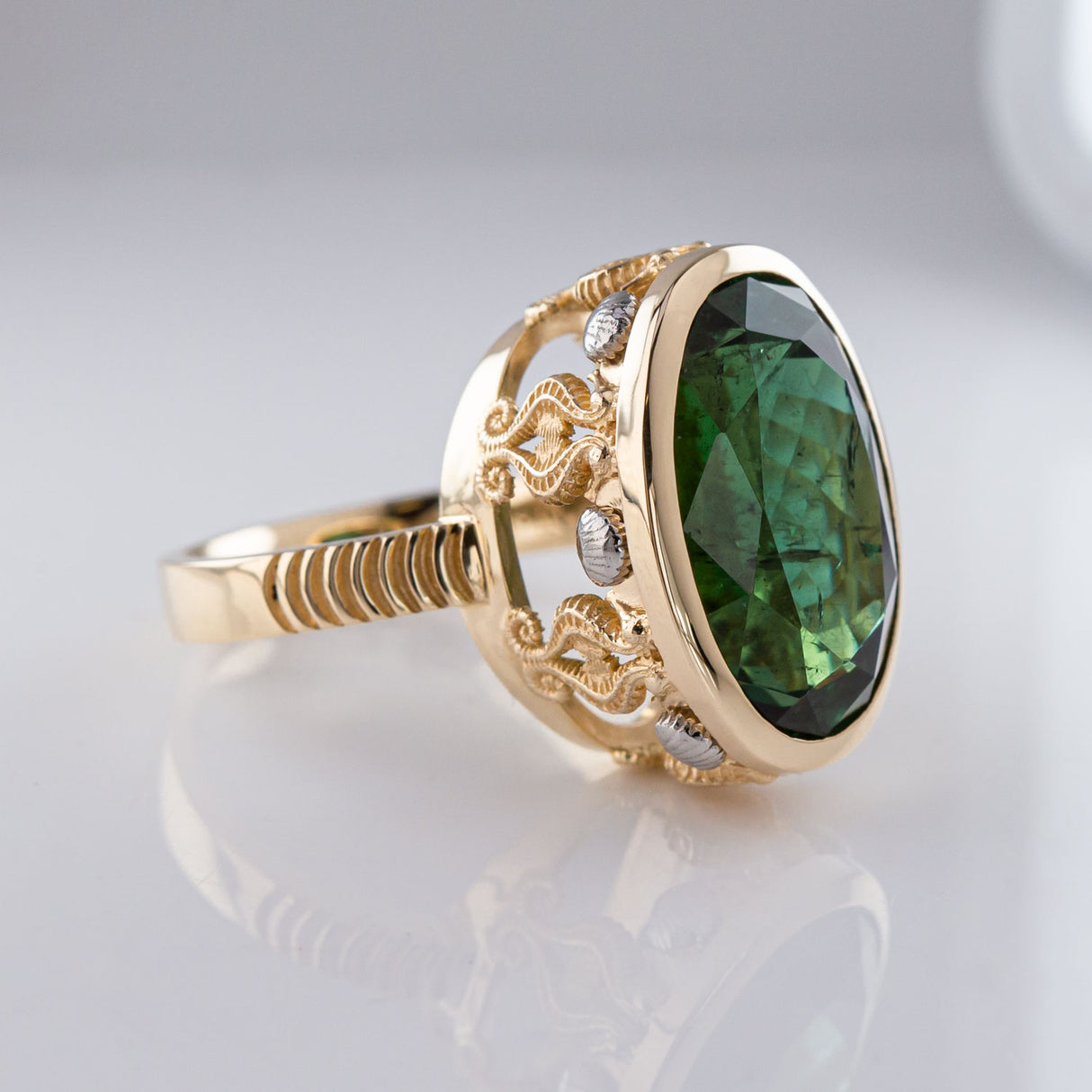 15.81 carat Teal Green Tourmaline Seahorse Temple ring in 9 carat Gold and Platinum