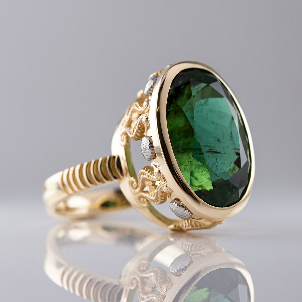 15.81 carat Teal Green Tourmaline Seahorse Temple ring in 9 carat Gold and Platinum