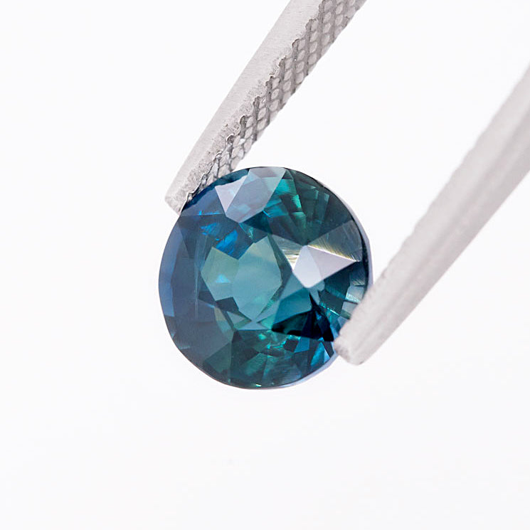 Vibrant Peacock Teal Sapphire Round cut 3.04 carat