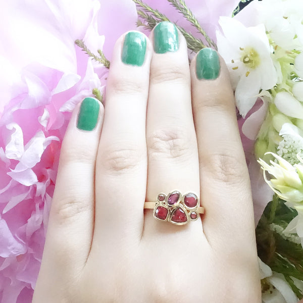 Berry Red Cluster ring set in 9 carat Yellow Gold
