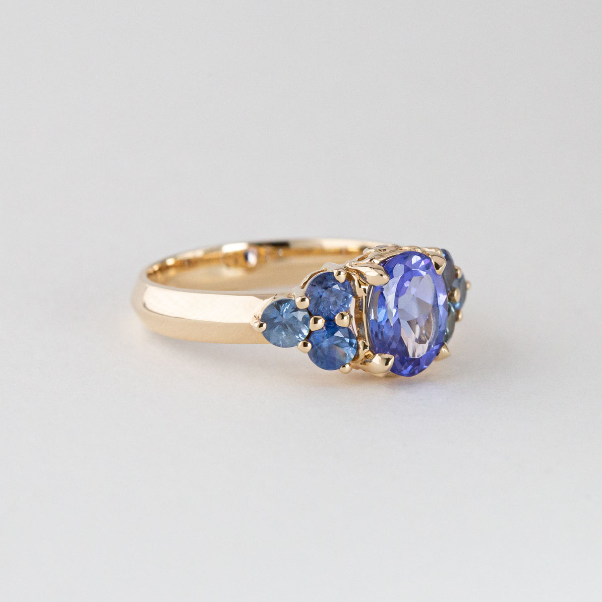 Bluebell Bouquet ring with Tanzanite and Sapphire in 14ct Yellow Gold