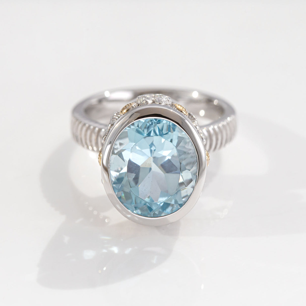 7.97 carat Aquamarine Oval Seahorse Temple ring in Platinum and 9 ct Gold