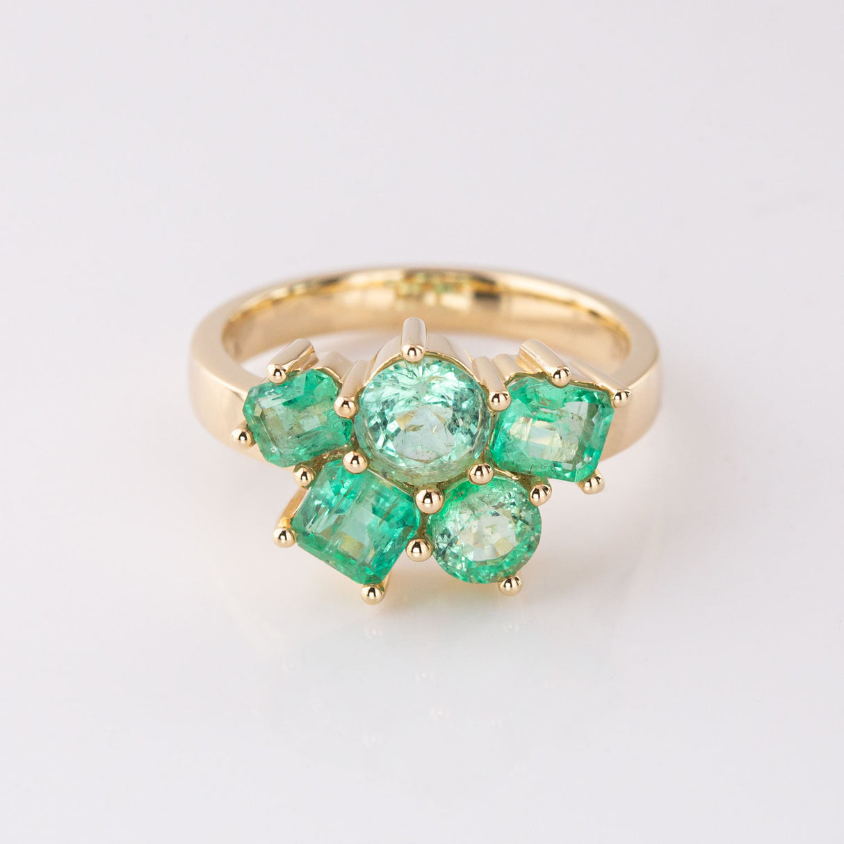 Ice Green Emerald Cluster ring in 9 carat Gold