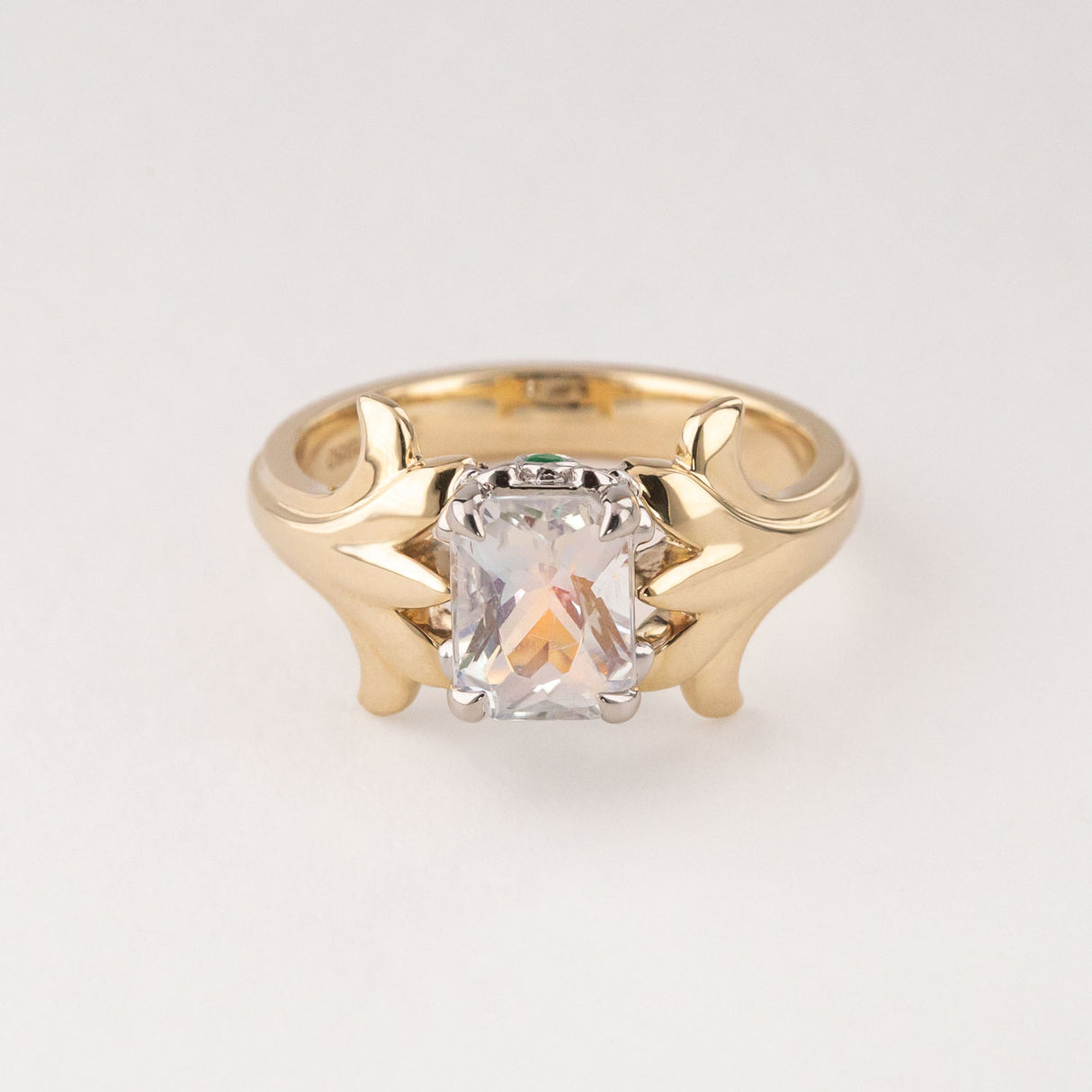 Peach Moonstone ring with Emeralds in 9 ct Gold and Platinum