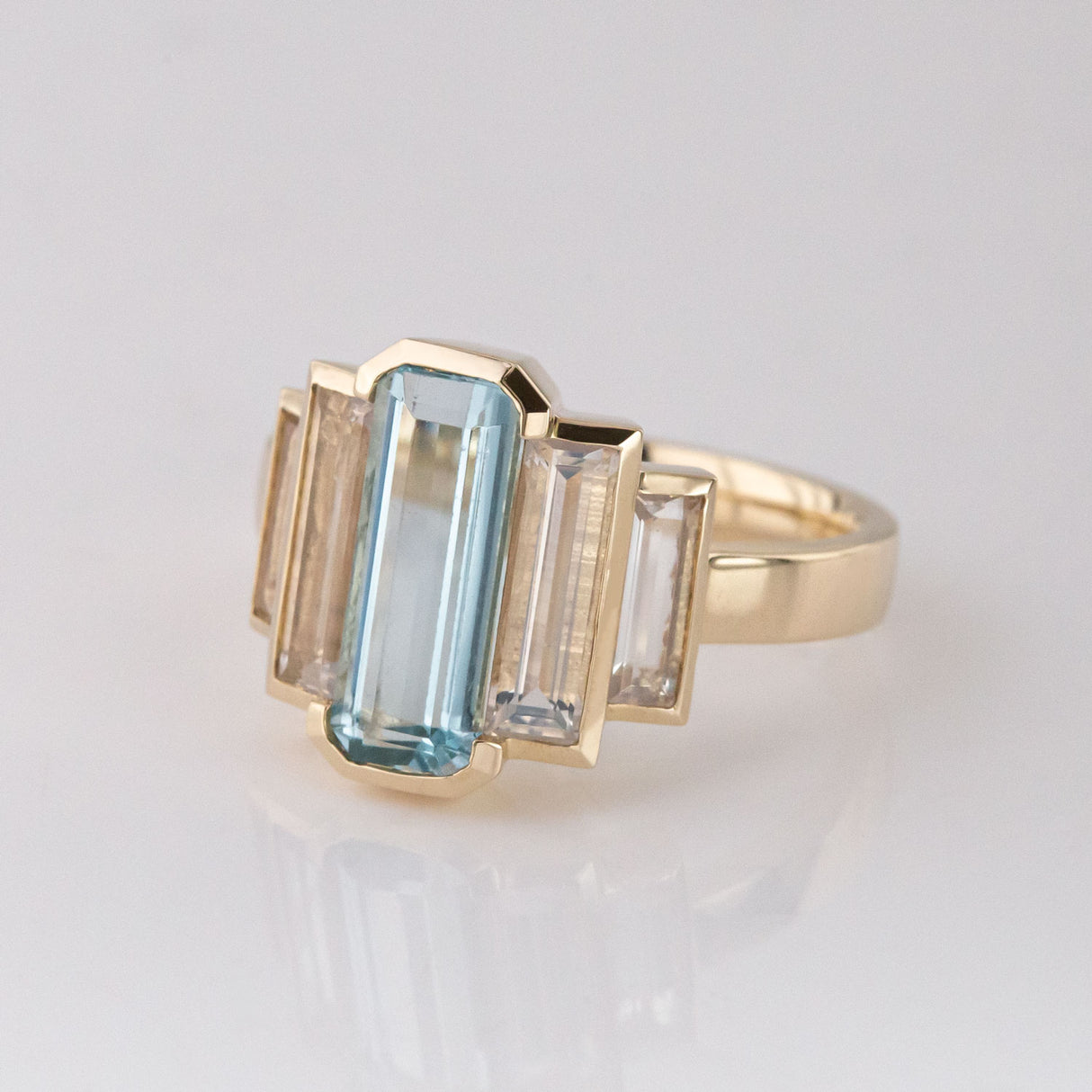 Aquamarine and Misty Quartz Refraction ring in 9 carat Gold