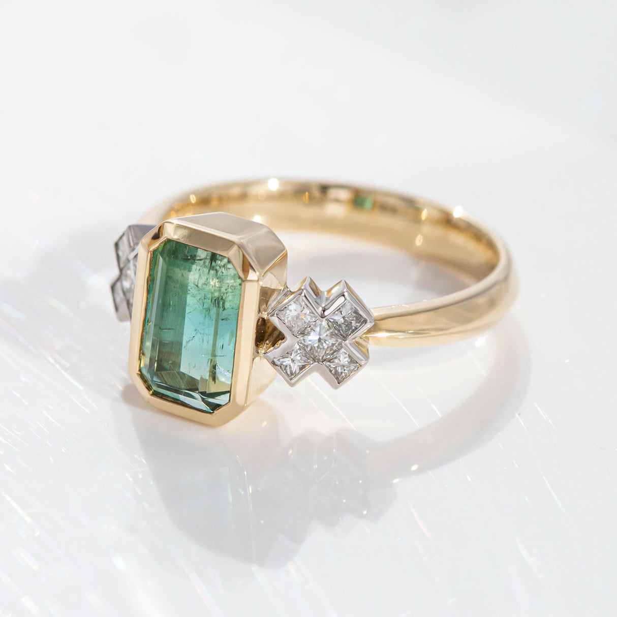 2.02 carat Blue to Green Tourmaline Kiss Kiss ring in Platinum and 9 carat Gold