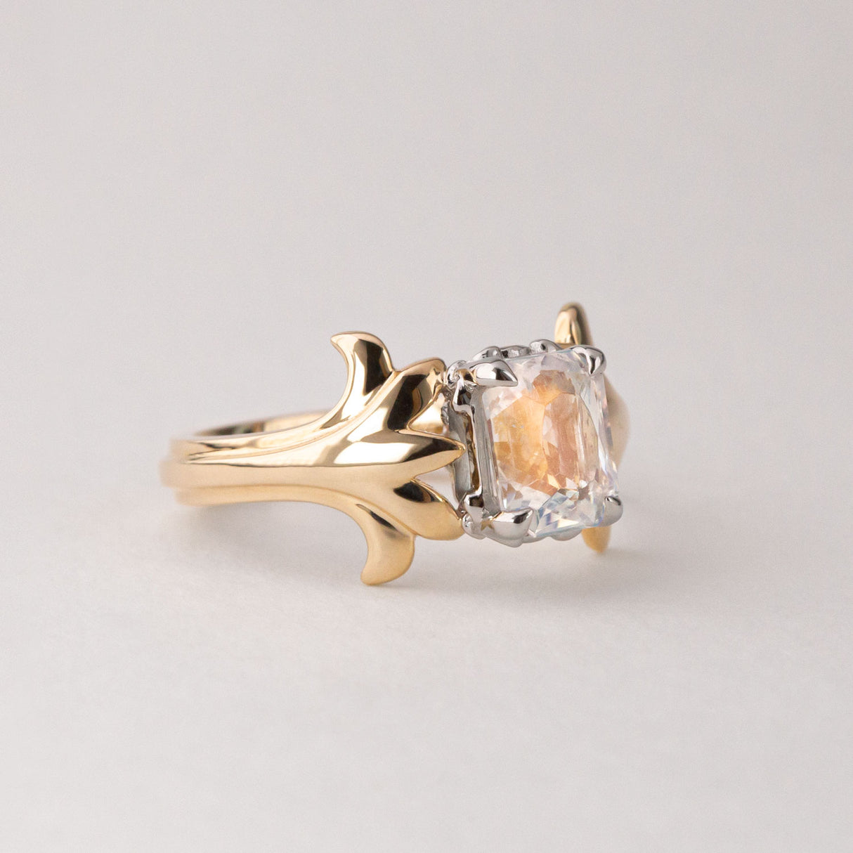 Peach Moonstone ring with Emeralds in 9 ct Gold and Platinum