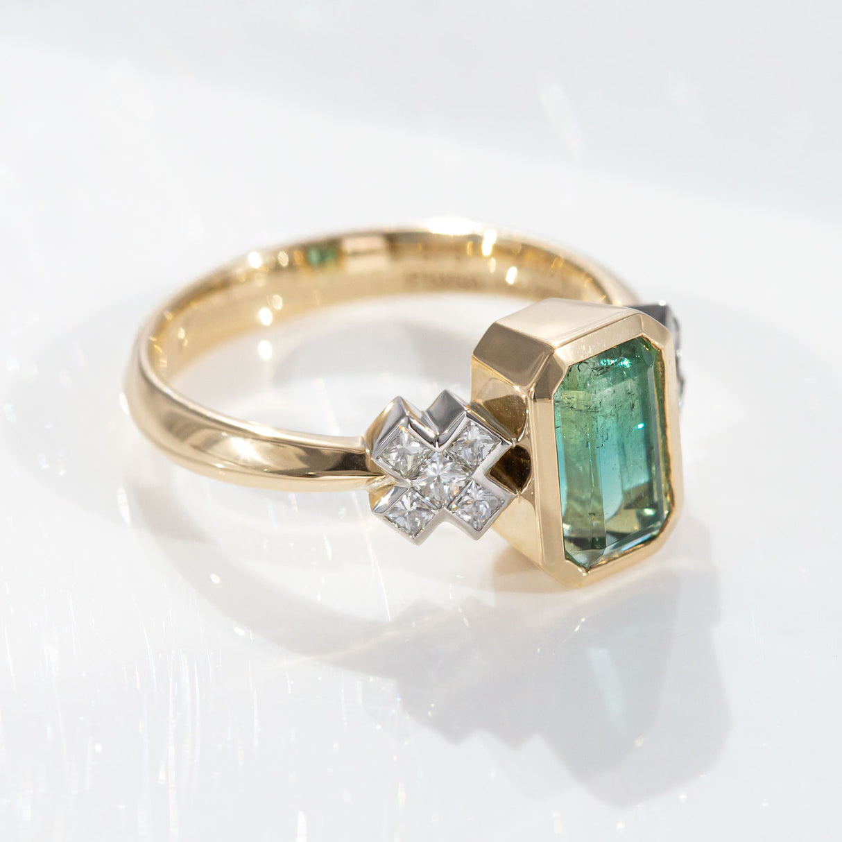 2.02 carat Blue to Green Tourmaline Kiss Kiss ring in Platinum and 9 carat Gold