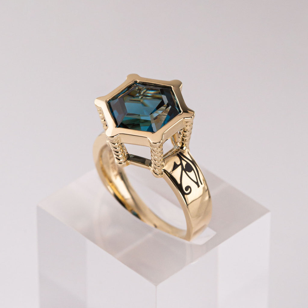 Eye of Horus / Eye of Ra ring with London Blue Topaz  in 9 carat Gold