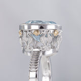 7.97 carat Aquamarine Oval Seahorse Temple ring in Platinum and 9 ct Gold