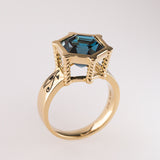 Eye of Horus / Eye of Ra ring with London Blue Topaz  in 9 carat Gold