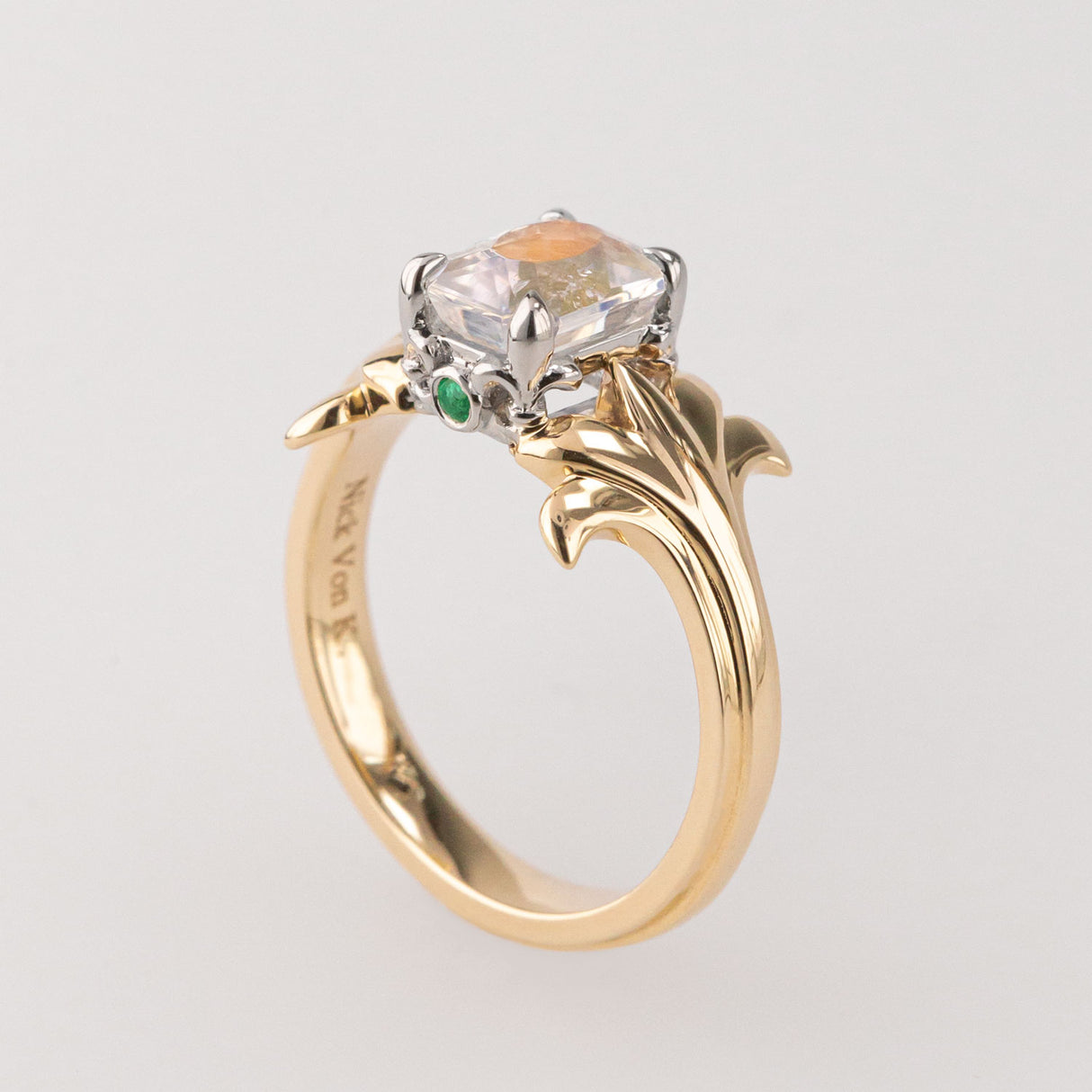 Peach Moonstone ring with Emeralds in 9 ct Gold and Platinum