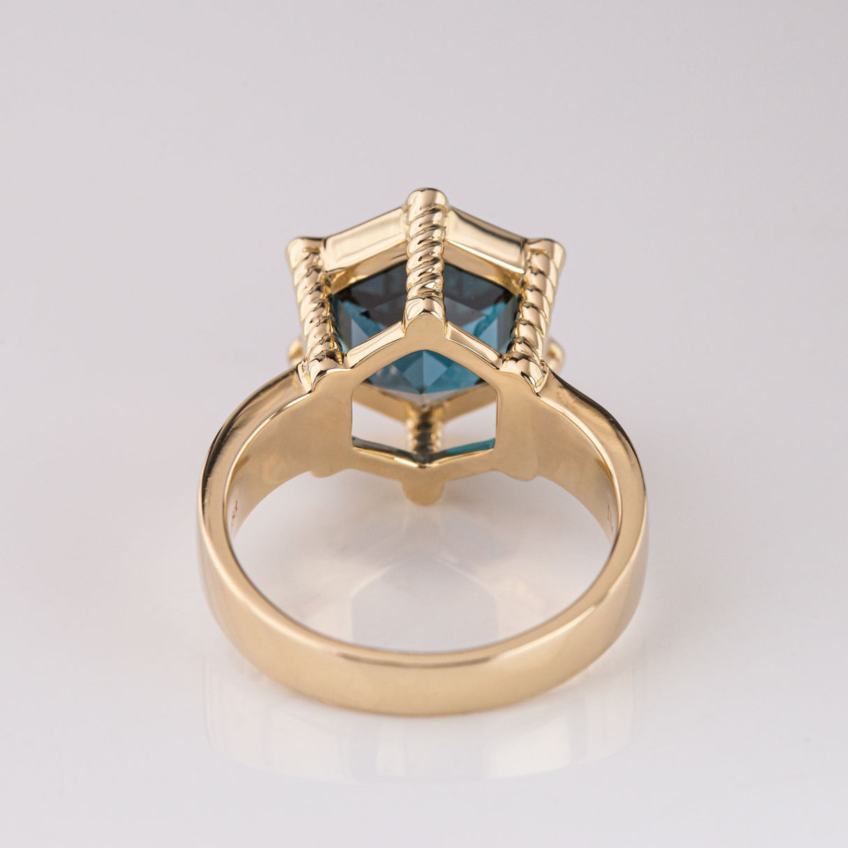 Eye of Horus / Eye of Ra ring with London Blue Topaz  in 9 carat Gold