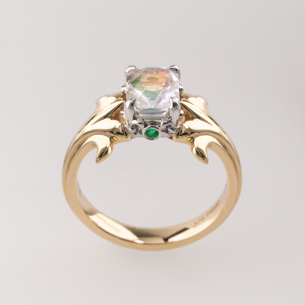 Peach Moonstone ring with Emeralds in 9 ct Gold and Platinum