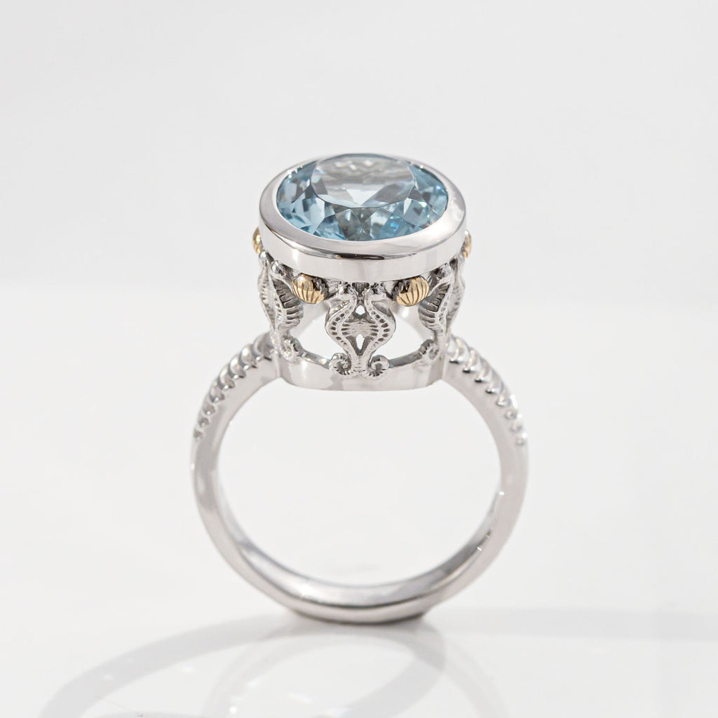 7.97 carat Aquamarine Oval Seahorse Temple ring in Platinum and 9 ct Gold