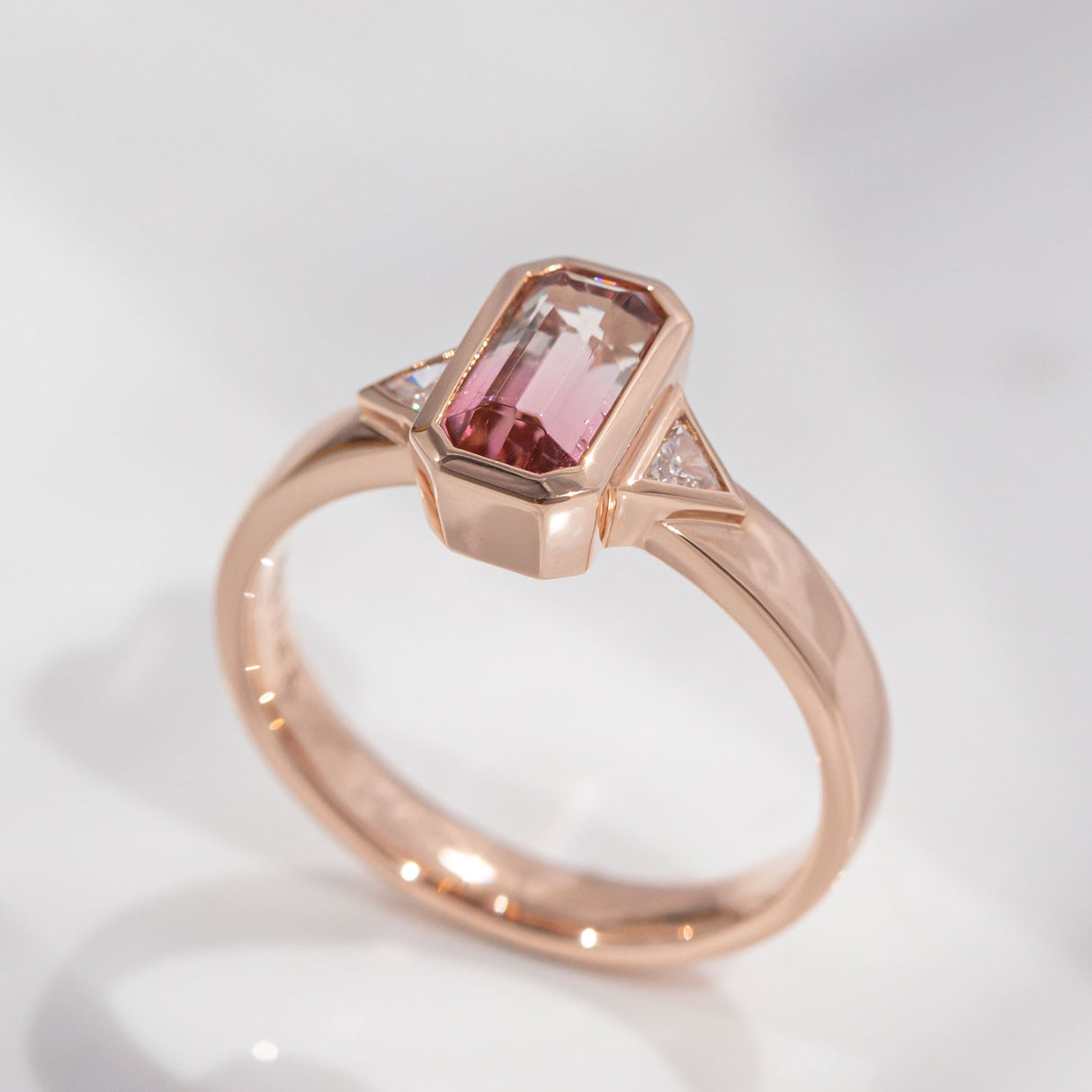 Pink Fade Tourmaline Twin Trillion ring in 9 carat Pink Gold