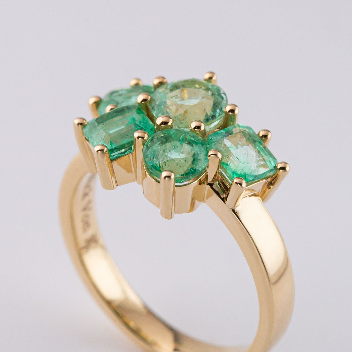 Ice Green Emerald Cluster ring in 9 carat Gold