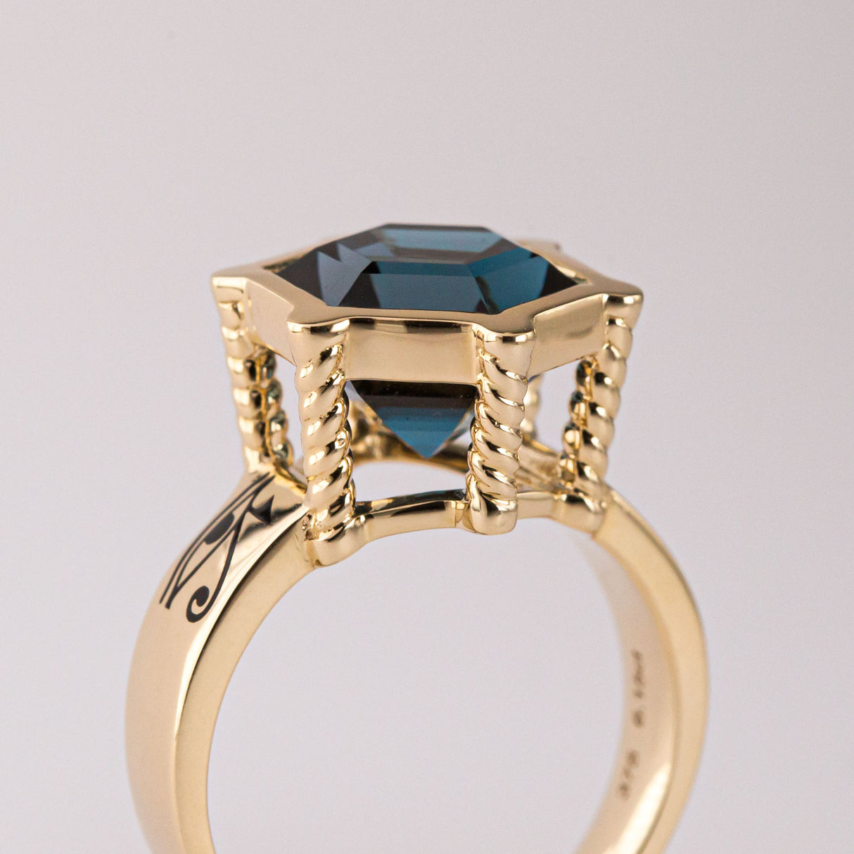 Eye of Horus / Eye of Ra ring with London Blue Topaz  in 9 carat Gold