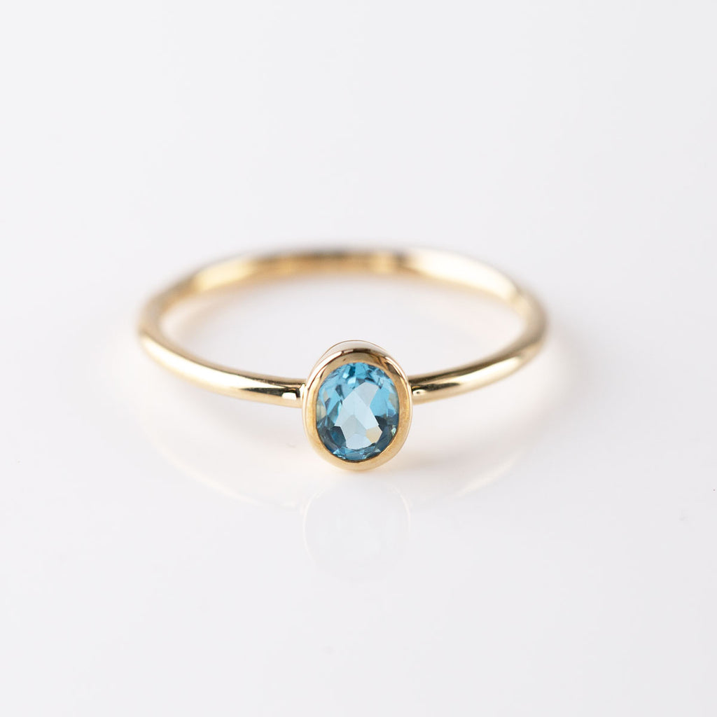 Swiss Blue Topaz Tiny Treasure Ring in 9 carat Yellow Gold
