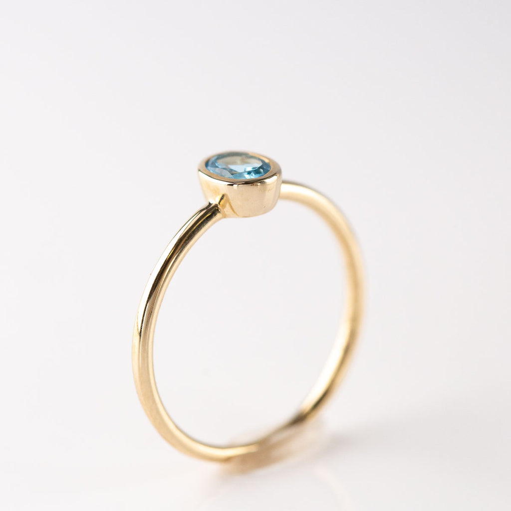 Swiss Blue Topaz Tiny Treasure Ring in 9 carat Yellow Gold