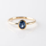 Steel Blue Oval Tourmaline Tiny Treasure Ring in 9 carat Yellow Gold