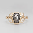 Nick Von K 9 Karat Yellow Gold Ring with Coffin Shaped Salt and Pepper Diamond bezel set and accented by Marquise shaped lab diamonds and twisted vines front angle 
