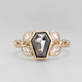 Nick Von K 9 Karat Yellow Gold Ring with Coffin Shaped Salt and Pepper Diamond bezel set and accented by Marquise shaped lab diamonds and twisted vines front angle 