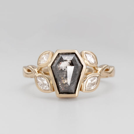Nick Von K 9 Karat Yellow Gold Ring with Coffin Shaped Salt and Pepper Diamond bezel set and accented by Marquise shaped lab diamonds and twisted vines front angle 