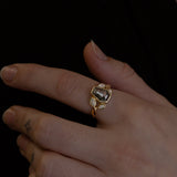 Nick Von K 9 Karat Yellow Gold Ring with Coffin Shaped Salt and Pepper Diamond bezel set and accented by Marquise shaped lab diamonds and twisted vines model shot