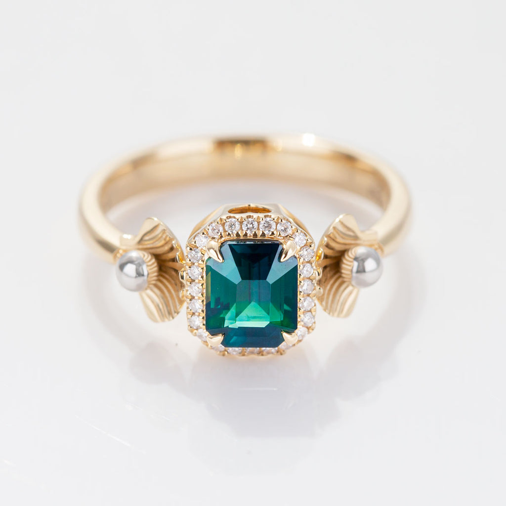 1.31 carat Emerald cut Teal Sapphire Ariel ring in 18 carat Yellow Gold with Platinum and Diamonds
