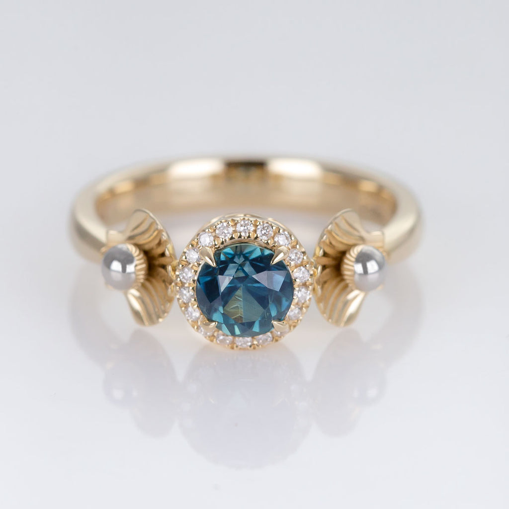 Teal Blue Round Sapphire Ariel ring in 9 carat Yellow Gold with Platinum and Diamonds