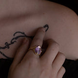 Nick Von K 9k Yellow Gold Royal Unicorn Ring with Amethyst side view model shot of fleur-de-lis claw setting and small gypsy set round cut Amethysts