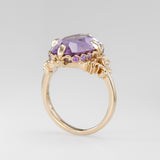 Nick Von K 9k Yellow Gold Royal Unicorn Ring with Amethyst side view of fleur-de-lis claw setting and small gypsy set round cut Amethysts