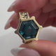 Eye of Horus / Eye of Ra ring with London Blue Topaz  in 9 carat Gold