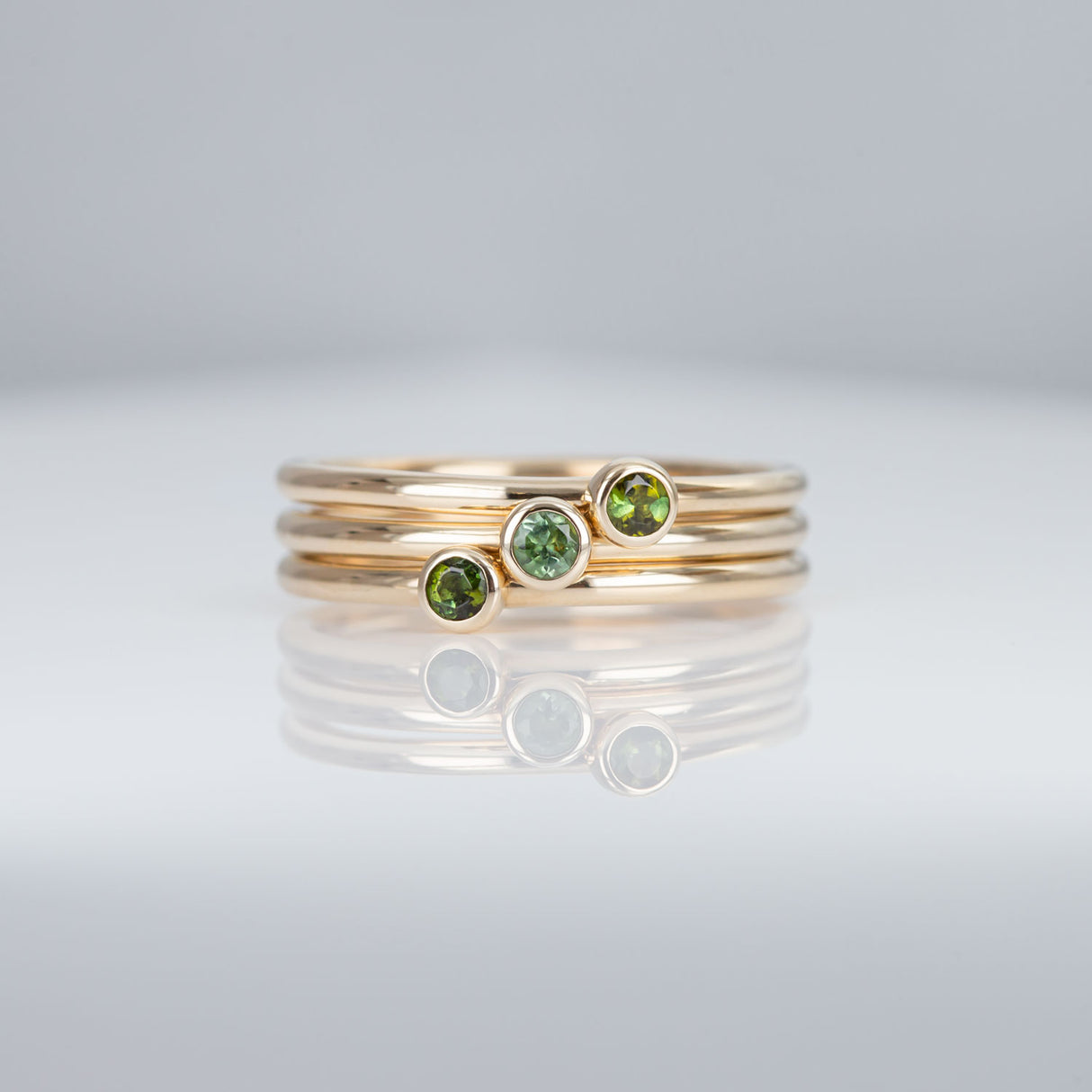 Moss Green 3 Muses ring with Tourmalines set in 9 carat Yellow Gold