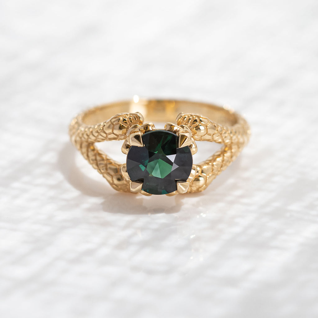 1.55 carat Deep Green Teal Sapphire Double Snake ring in 18 carat Yellow Gold