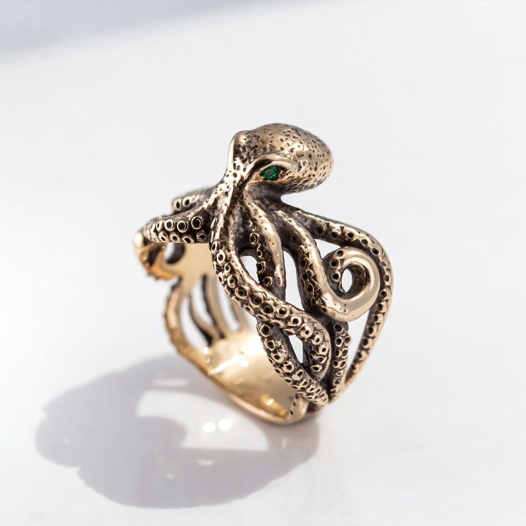 Solid 9 carat Gold Octopus ring with Emerald Eyes