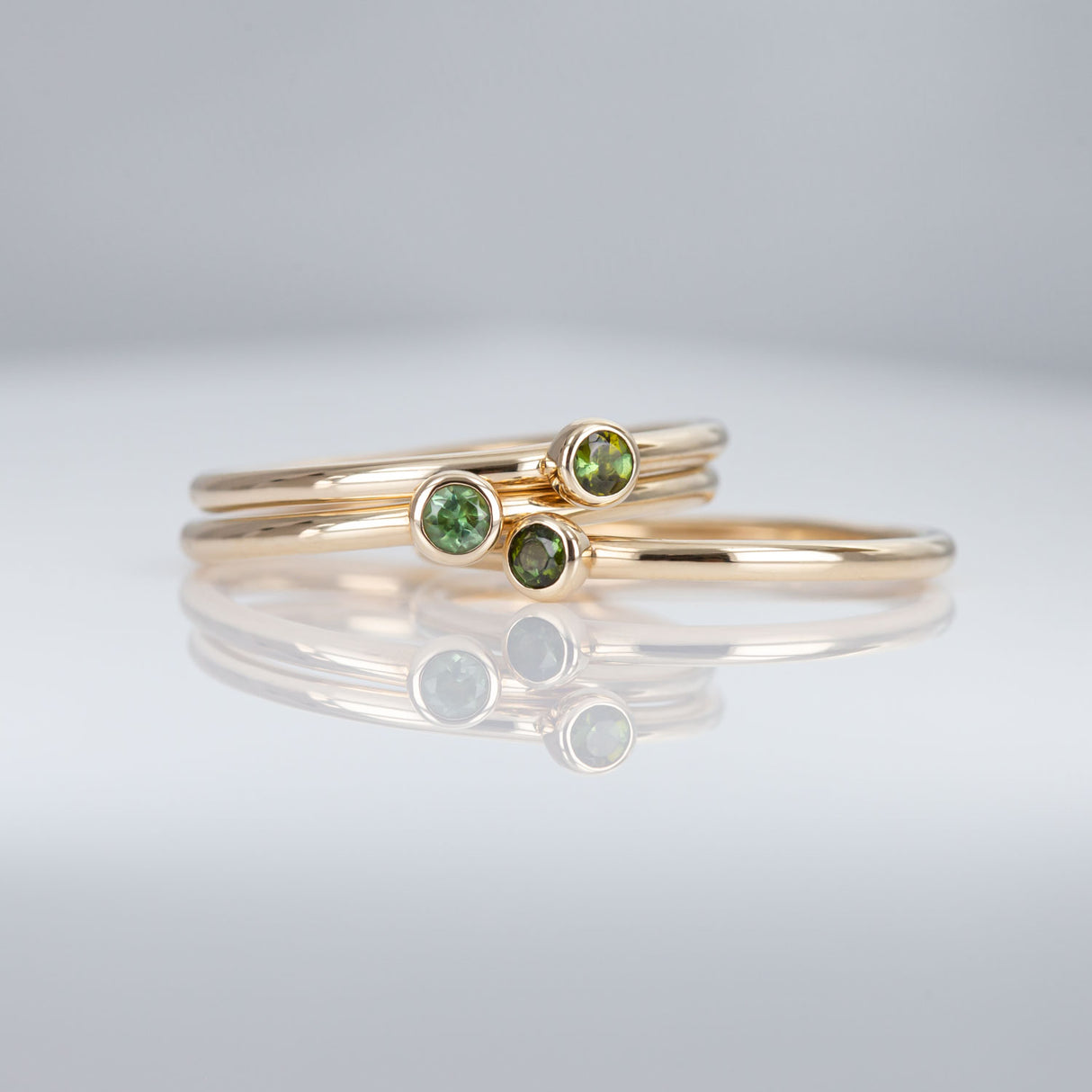 Moss Green 3 Muses ring with Tourmalines set in 9 carat Yellow Gold