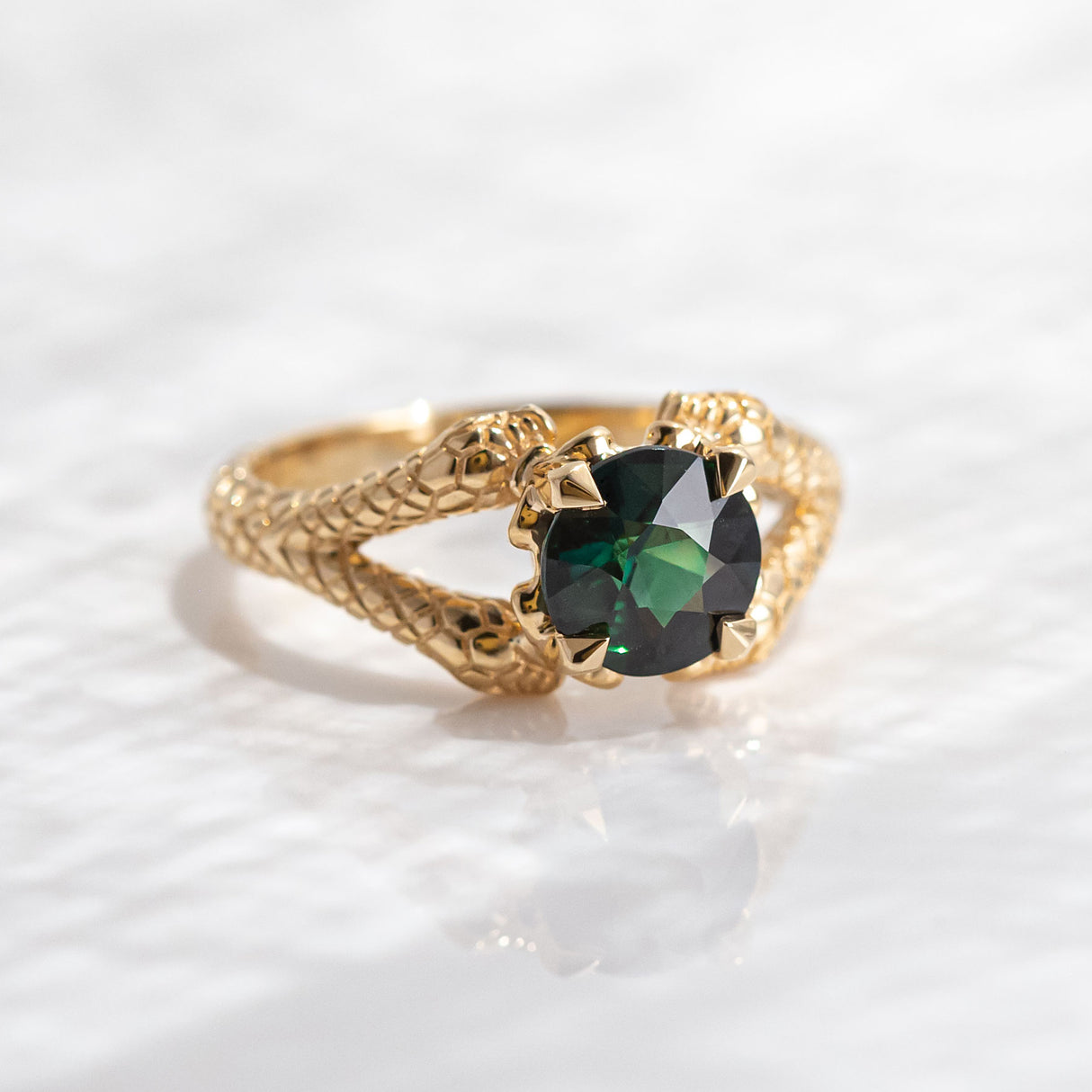 1.55 carat Deep Green Teal Sapphire Double Snake ring in 18 carat Yellow Gold