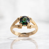 1.55 carat Deep Green Teal Sapphire Double Snake ring in 18 carat Yellow Gold