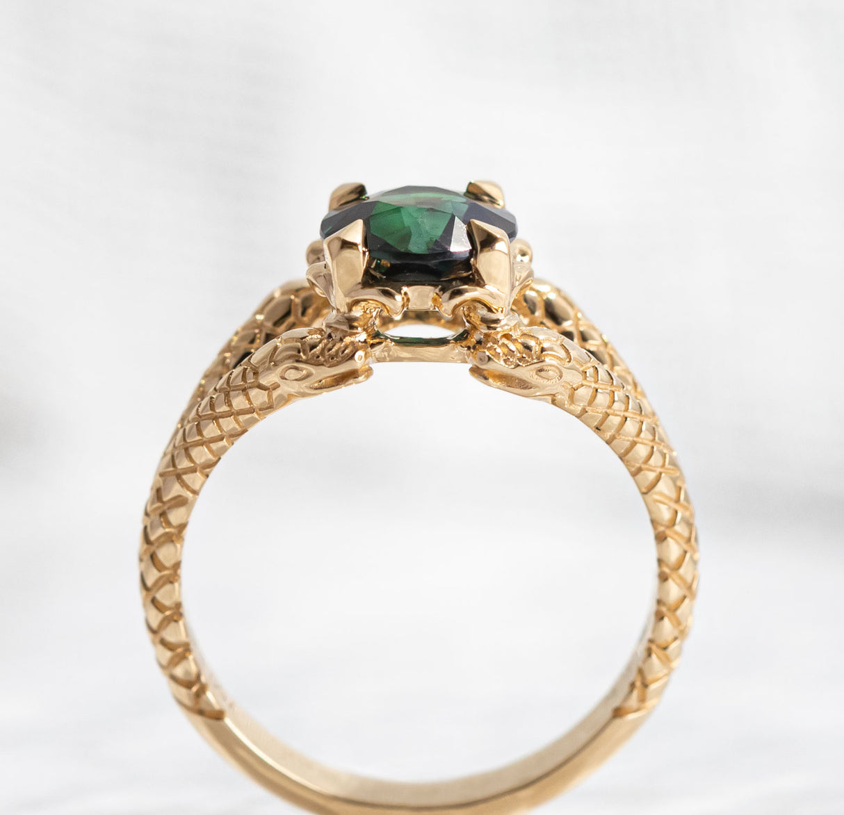 1.55 carat Deep Green Teal Sapphire Double Snake ring in 18 carat Yellow Gold